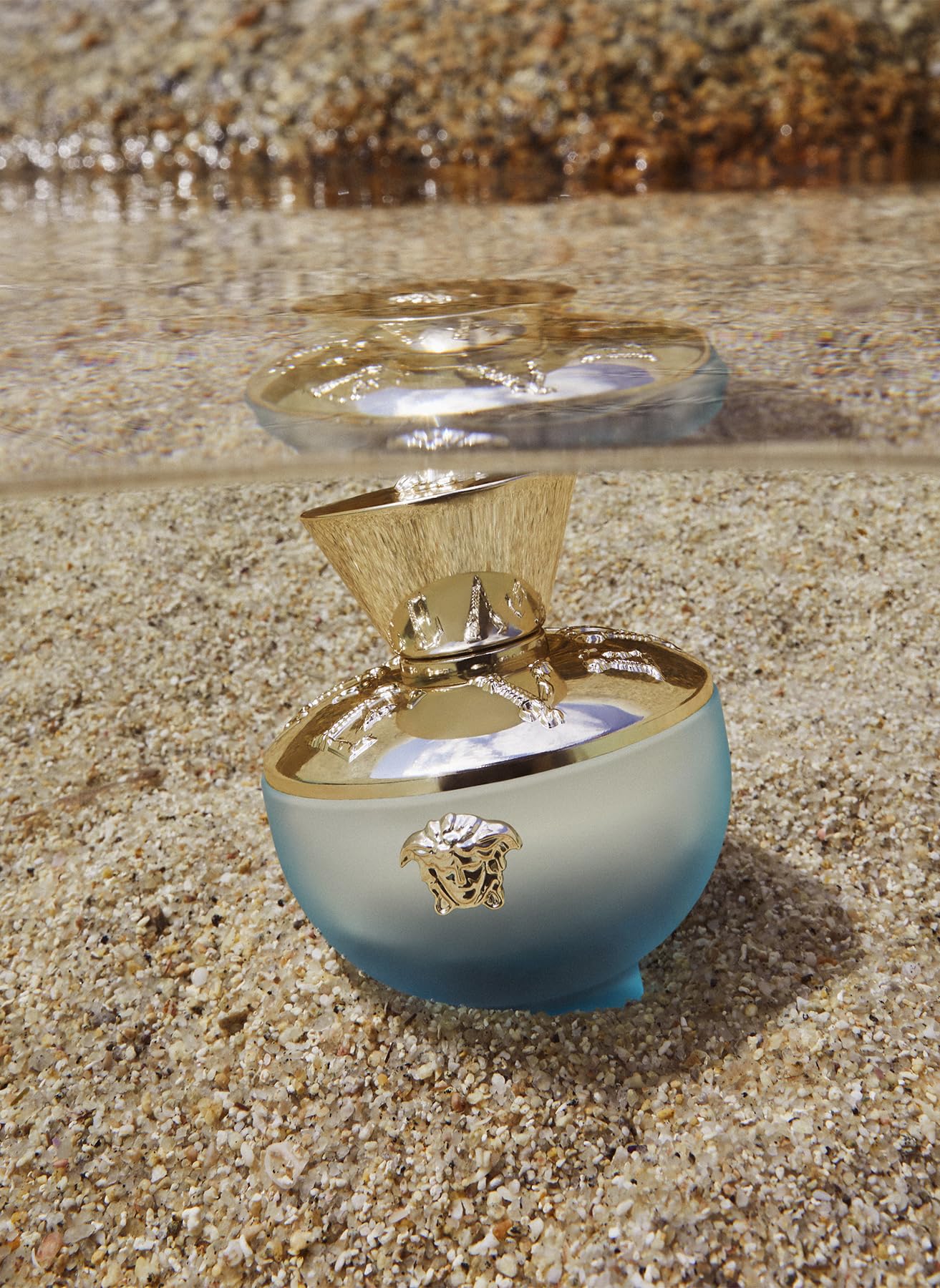 Etiqueta-detalle de Dylan Turquoise Pour Femme muestra elegancia y fragancia.