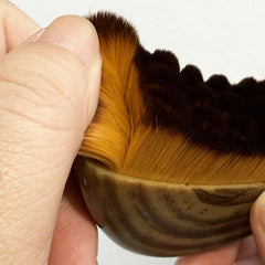 VOUGH masaje linfático en mejillas y mandíbula para relajación facial.