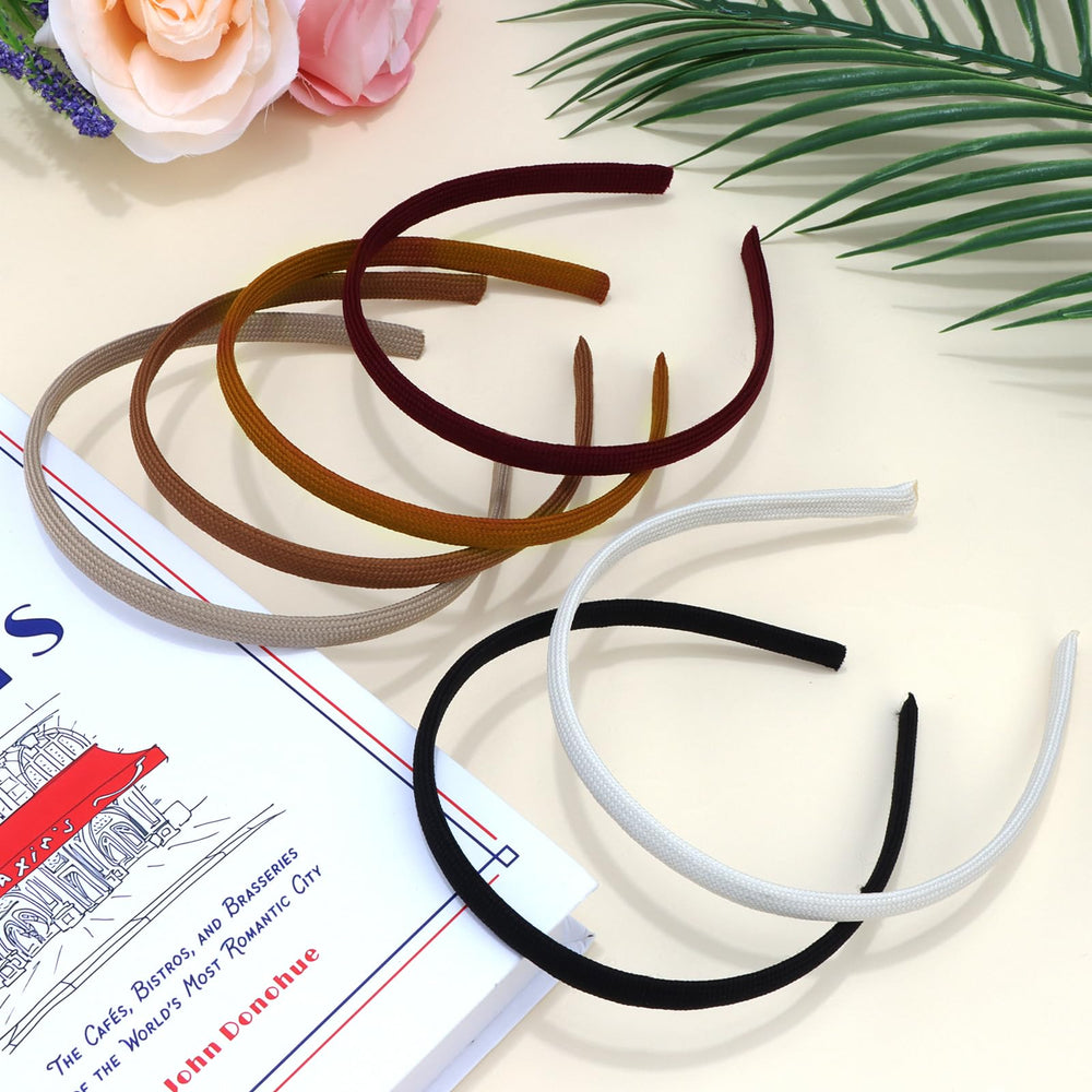 Diadema Vovii delgada con tejido transpirable ideal para sesiones largas.