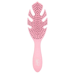 Wet Brush Go Green rosa con cerdas IntelliFlex desenreda sin tirones.