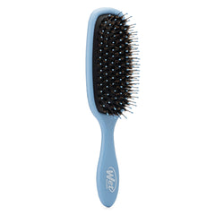 Cerdas IntelliFlex de Wet Brush en primer plano para desatar nudos con menos roturas