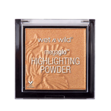 Iluminador wet n wild MegaGlo dorado profundo realza pómulos con brillo intenso