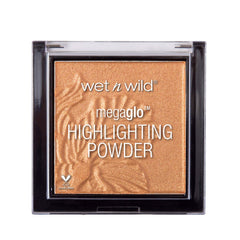 Iluminador wet n wild MegaGlo dorado profundo realza pómulos con brillo intenso