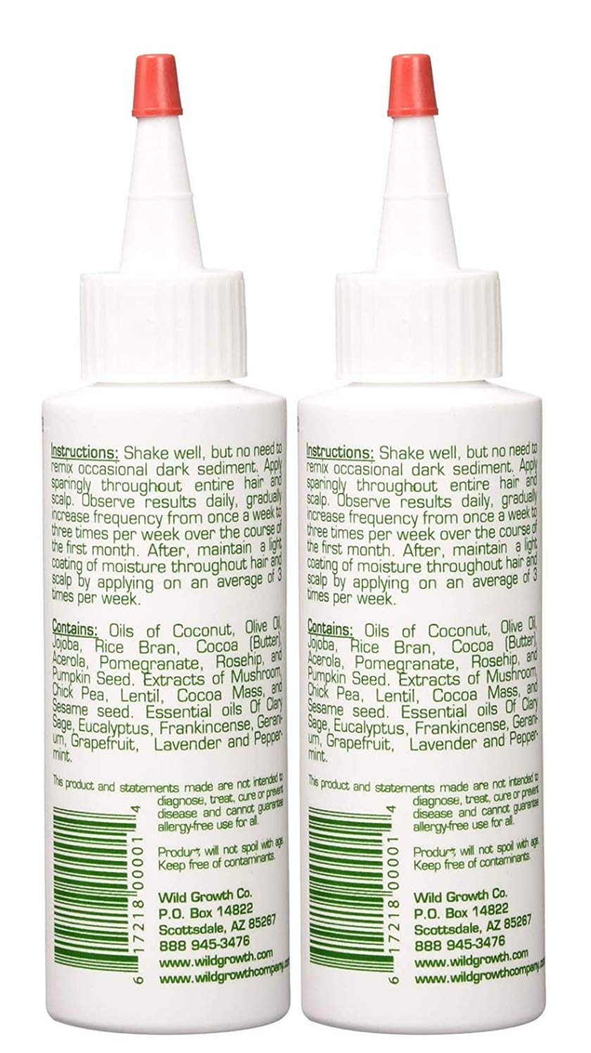 Aplicación de Wild Growth Hair Oil en el cuero cabelludo para masaje.