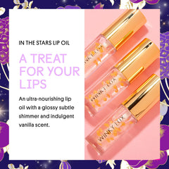 Winky Lux In The Stars Lip Oil con estrellas doradas para un look glam.