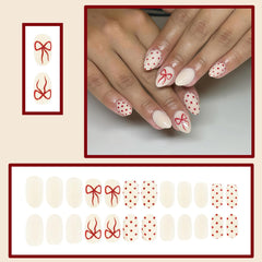 Uñas WUHCIM en forma almendra con lunares para manicure sofisticada.