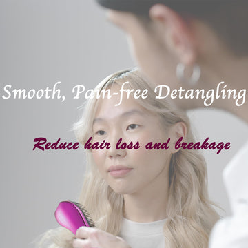 WYNK cepillo desenredante con mango ergonómico rosa para peinados rápidos.