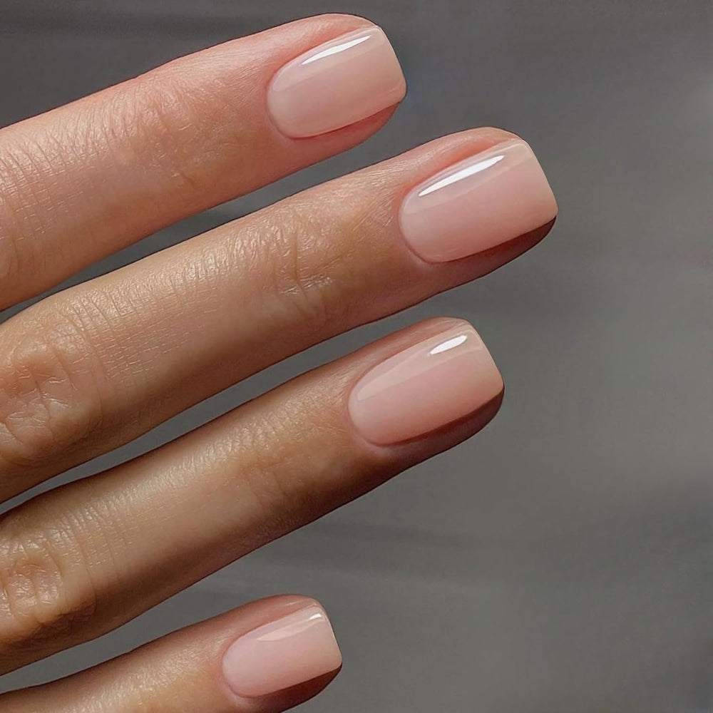 XCREANDO uñas postizas rosa claro corto cuadrado para uso diario sin esfuerzo.