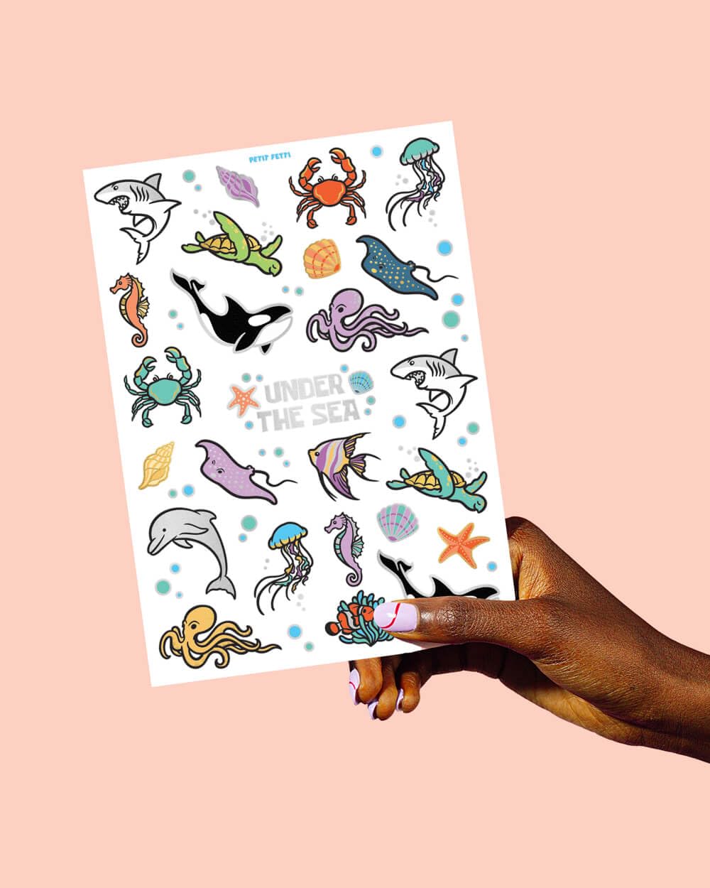 tatuajes xo Fetti de diseños marinos coloridos para aprendizaje y juego.