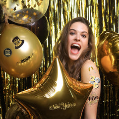 Tatuajes XZENTIRA con diseños negro-dorado para NYE elegante.