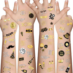 Tatuajes XZENTIRA con fuegos artificiales en negro y dorado para fiesta.