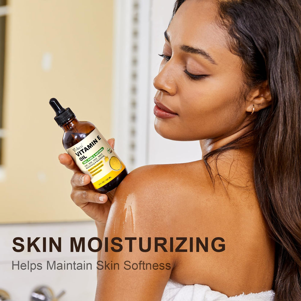 Yoken aceite vitamina E para aplicación en piel, hidratación suave.