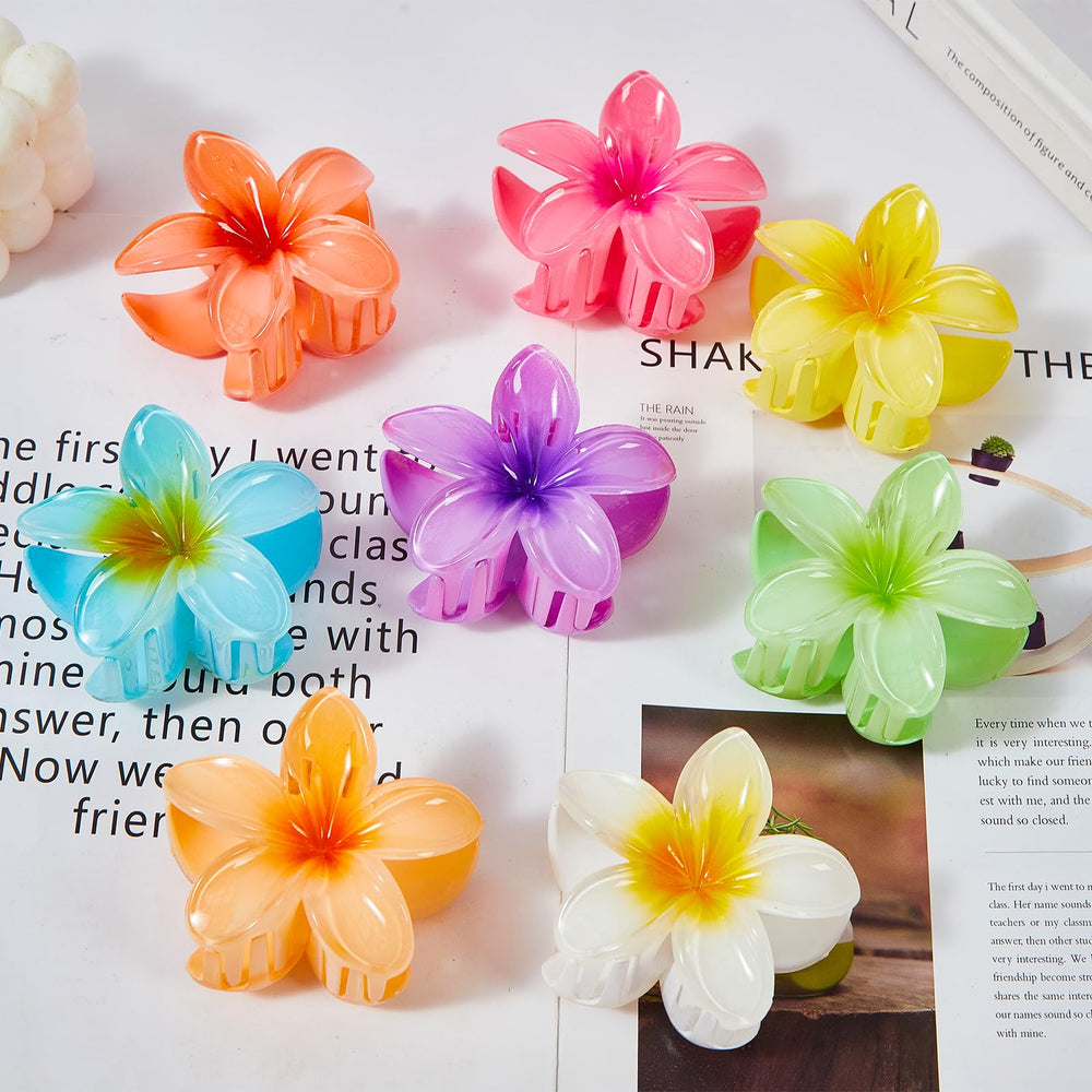 Clips flor hawaiana de YosaiHom en menta perfectos para peinados elegantes.