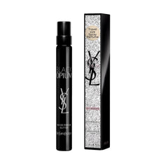 YSL Black Opium Glitter bottle closeup showing festive glitter finish.