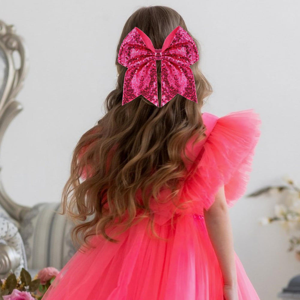 Clip de cabello Zolyco con lentejuelas rosas grandes para looks festivos