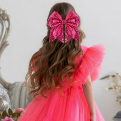 Clip de cabello Zolyco con lentejuelas rosas grandes para looks festivos